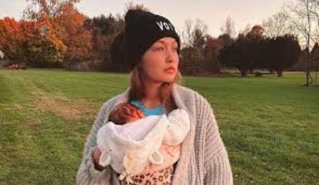 Gigi with her infant